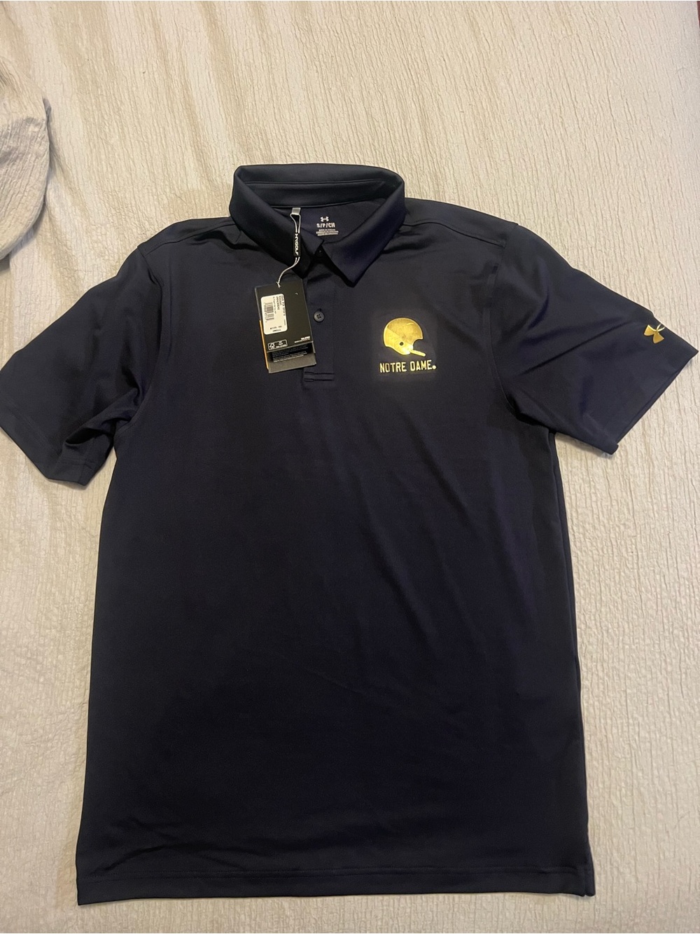 Under Armour Navy Polo with Gold Notre Dame Helmet Logo